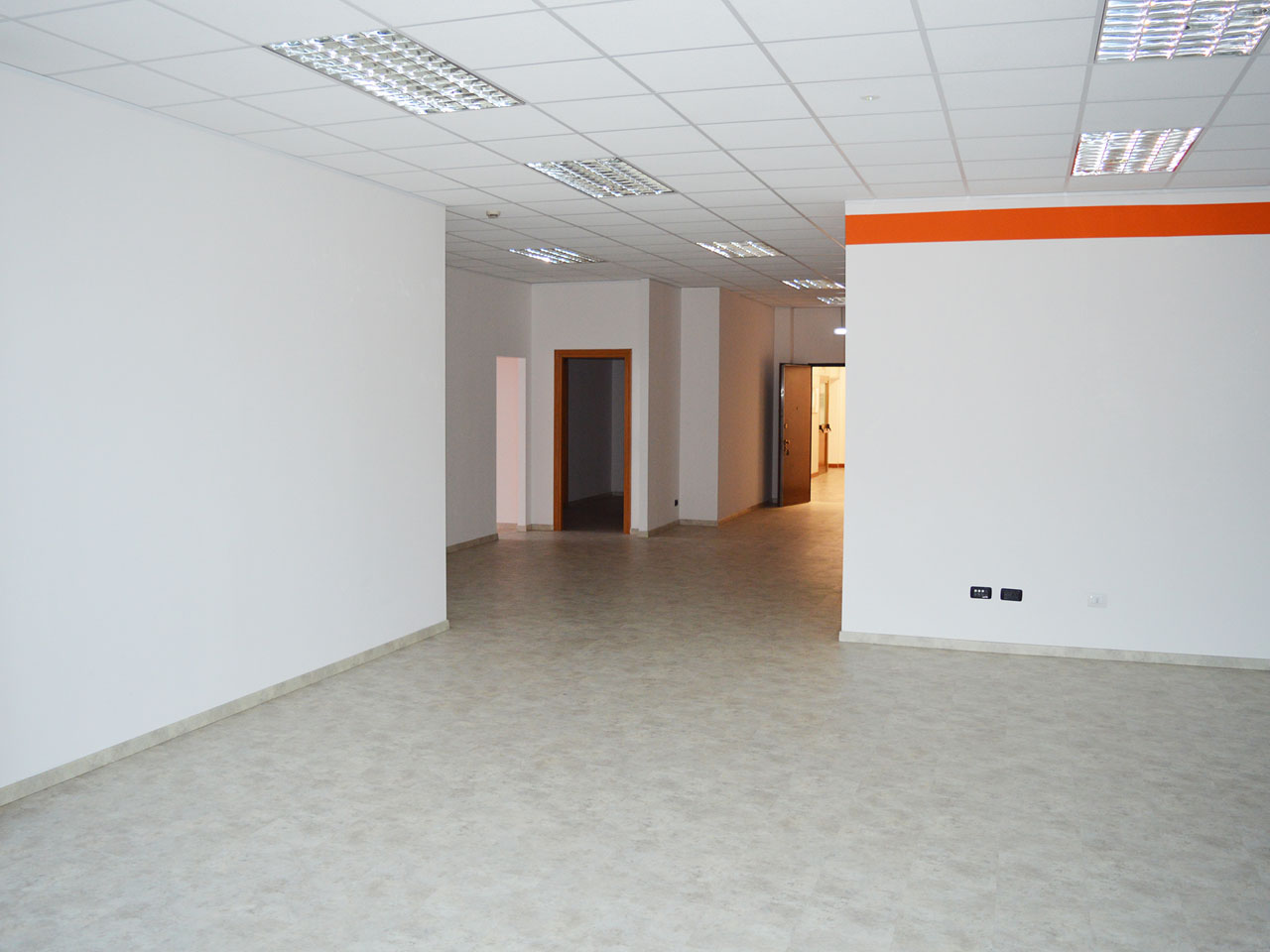Office view from the first open space to the entrance